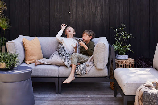 Kids playing on Outer Outdoor Furniture | Outer https://liveouter.com/
