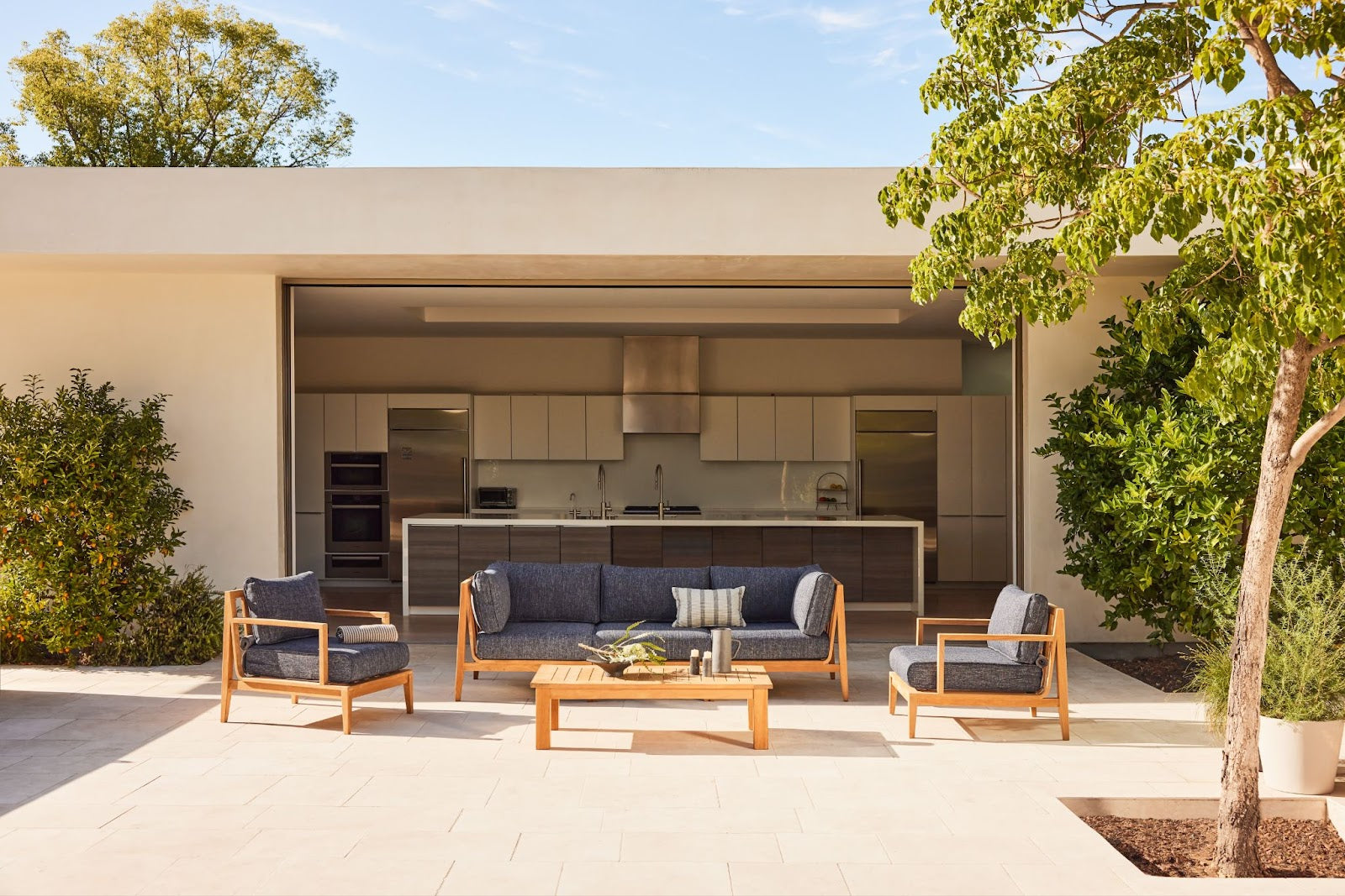 Teak sofa with armchairs and teak square leg coffee table https://liveouter.com