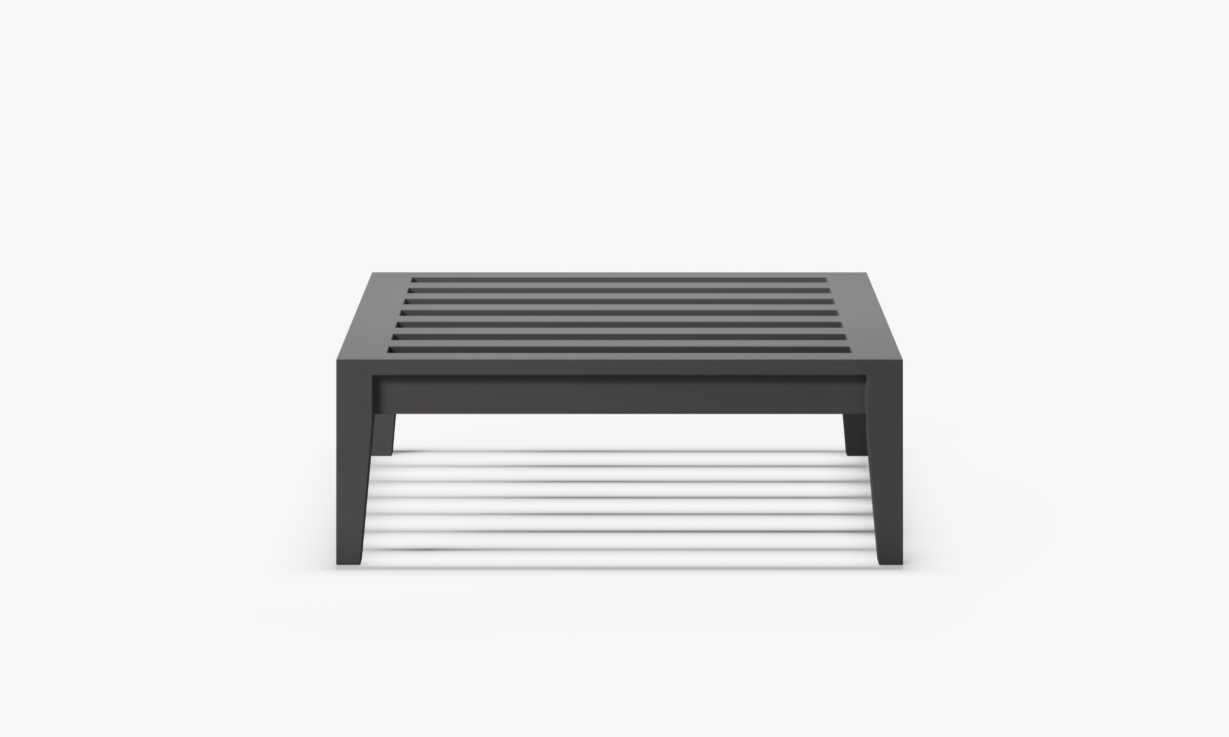 Minimalist aluminum ottoman frame with a slatted top, finished in matte charcoal, isolated on a clean white background to highlight structure, material, and modern outdoor design aesthetic