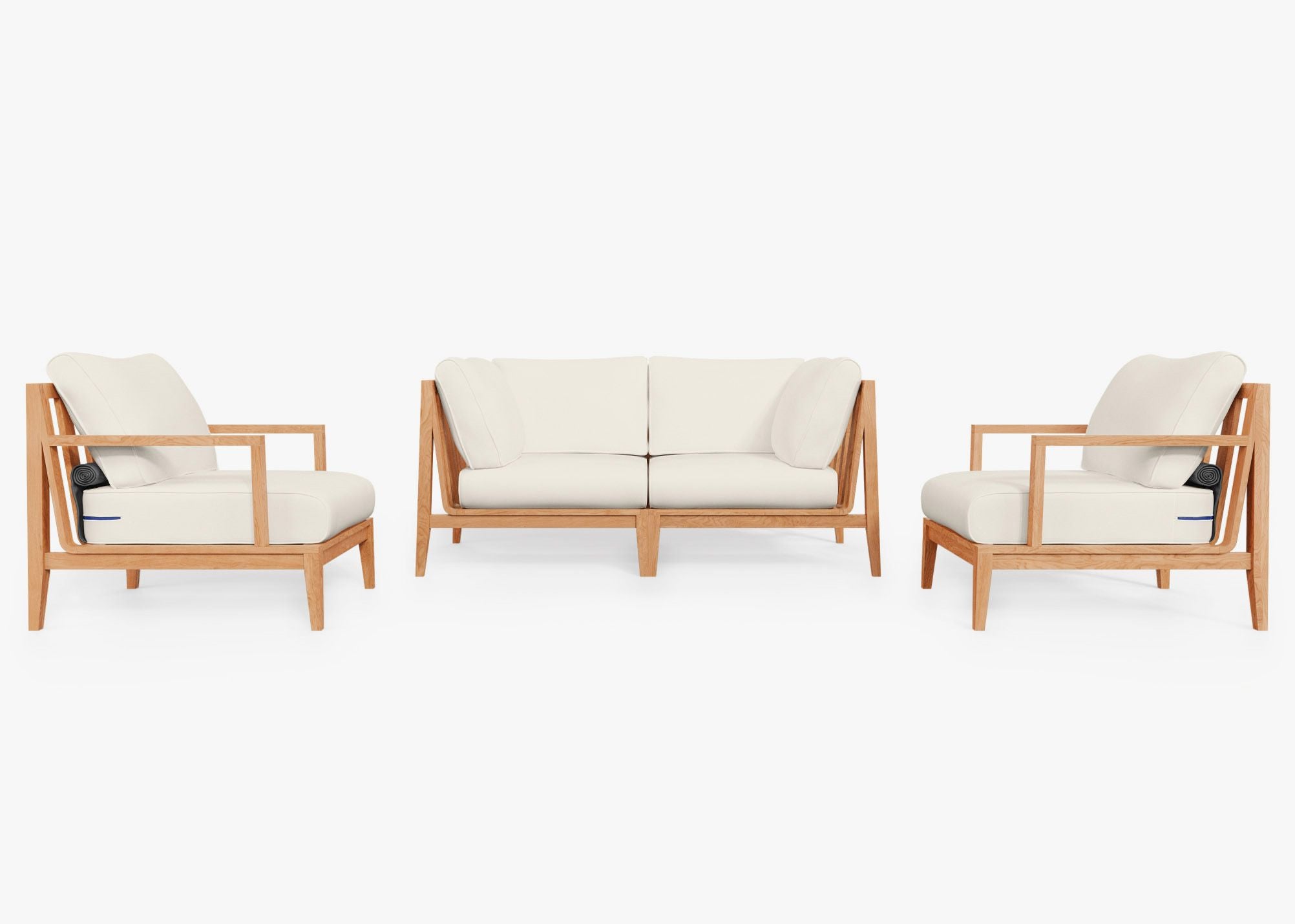 Teak outdoor sofa with two matching armchairs, featuring cream cushions and a sturdy wooden frame, arranged on a patio.-teak outdoor sofa-outer #color_palisades cream