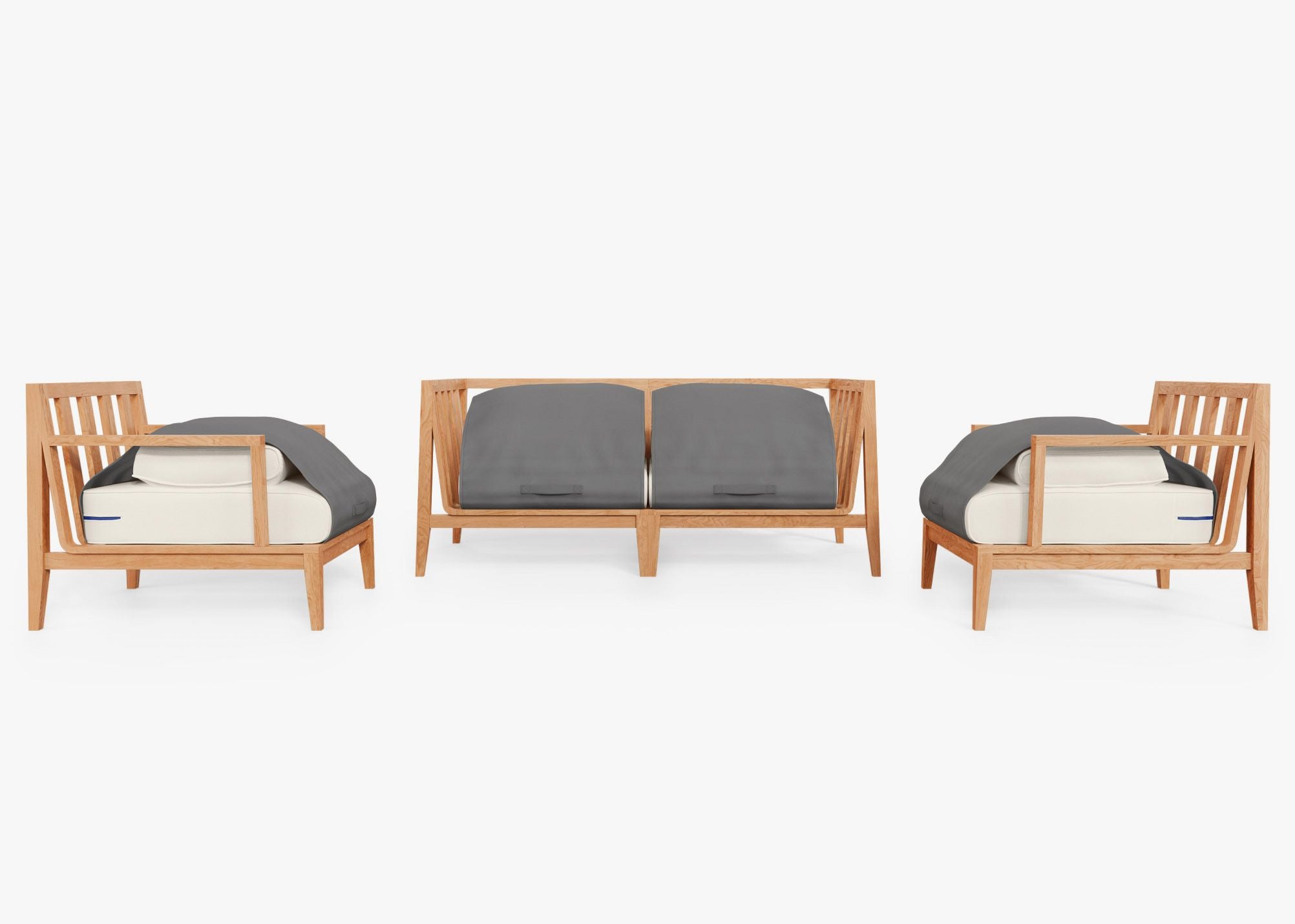 A teak outdoor sofa with matching armchairs, featuring cream cushions and a sturdy wooden frame, arranged on a patio setting.-teak outdoor sofa-outer #color_palisades cream