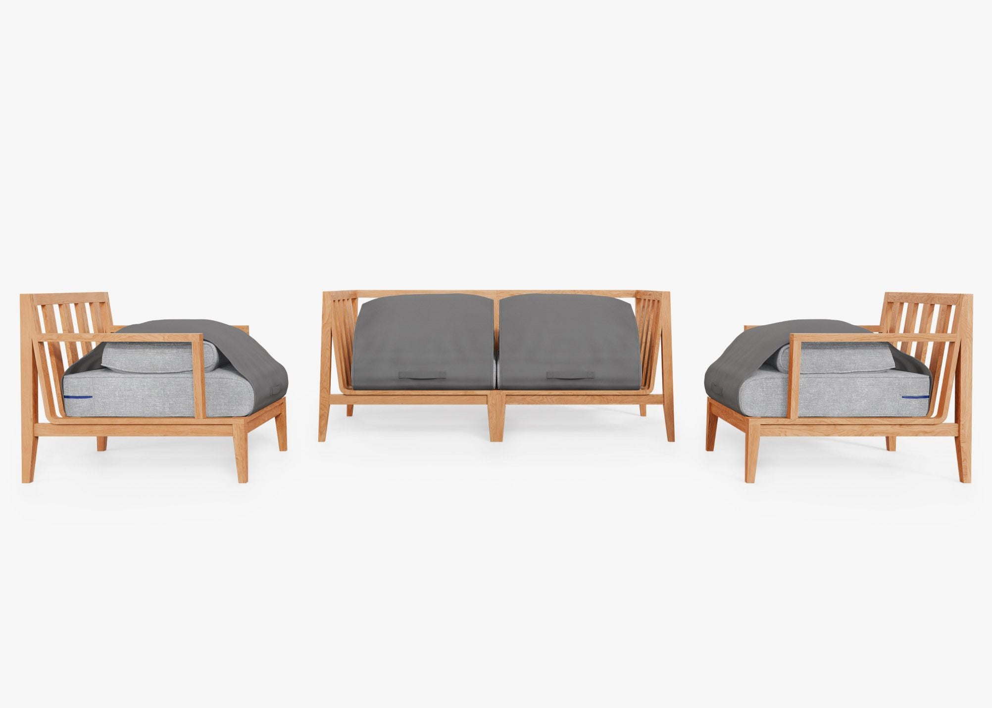 Teak outdoor sofa with two matching armchairs, featuring gray cushions and a sturdy wooden frame, arranged on a patio.-teak outdoor sofa-outer #color_pacific fog gray