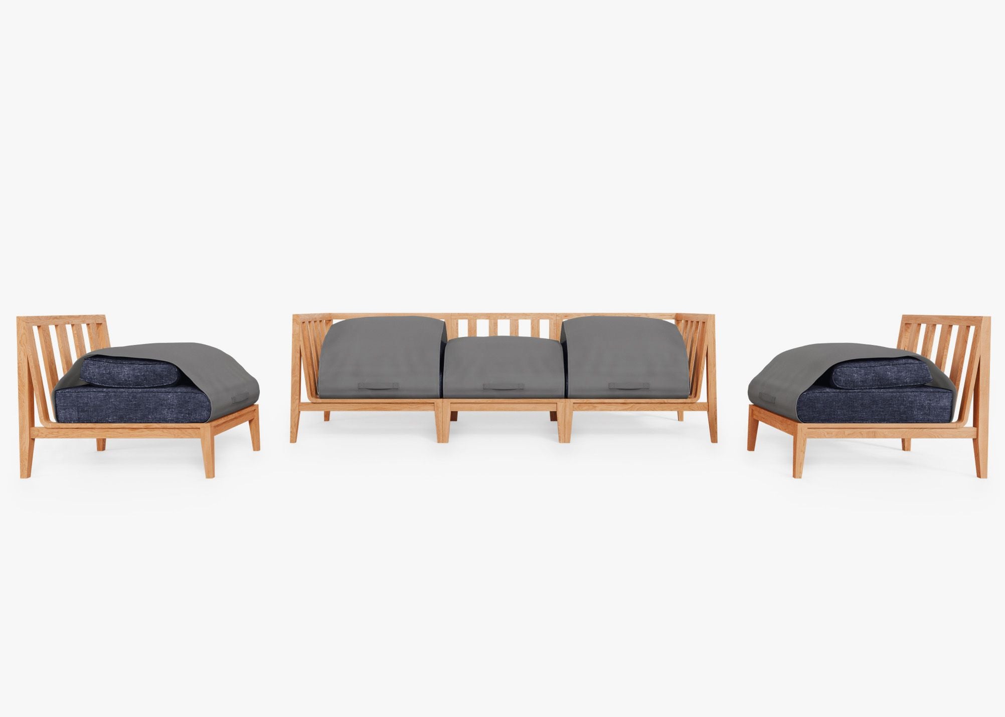 A teak outdoor sofa with armless chairs in navy cushions arranged on a wooden deck, showcasing a five-seat outer shell design.-teak outdoor sofa-outer #color_deep sea navy