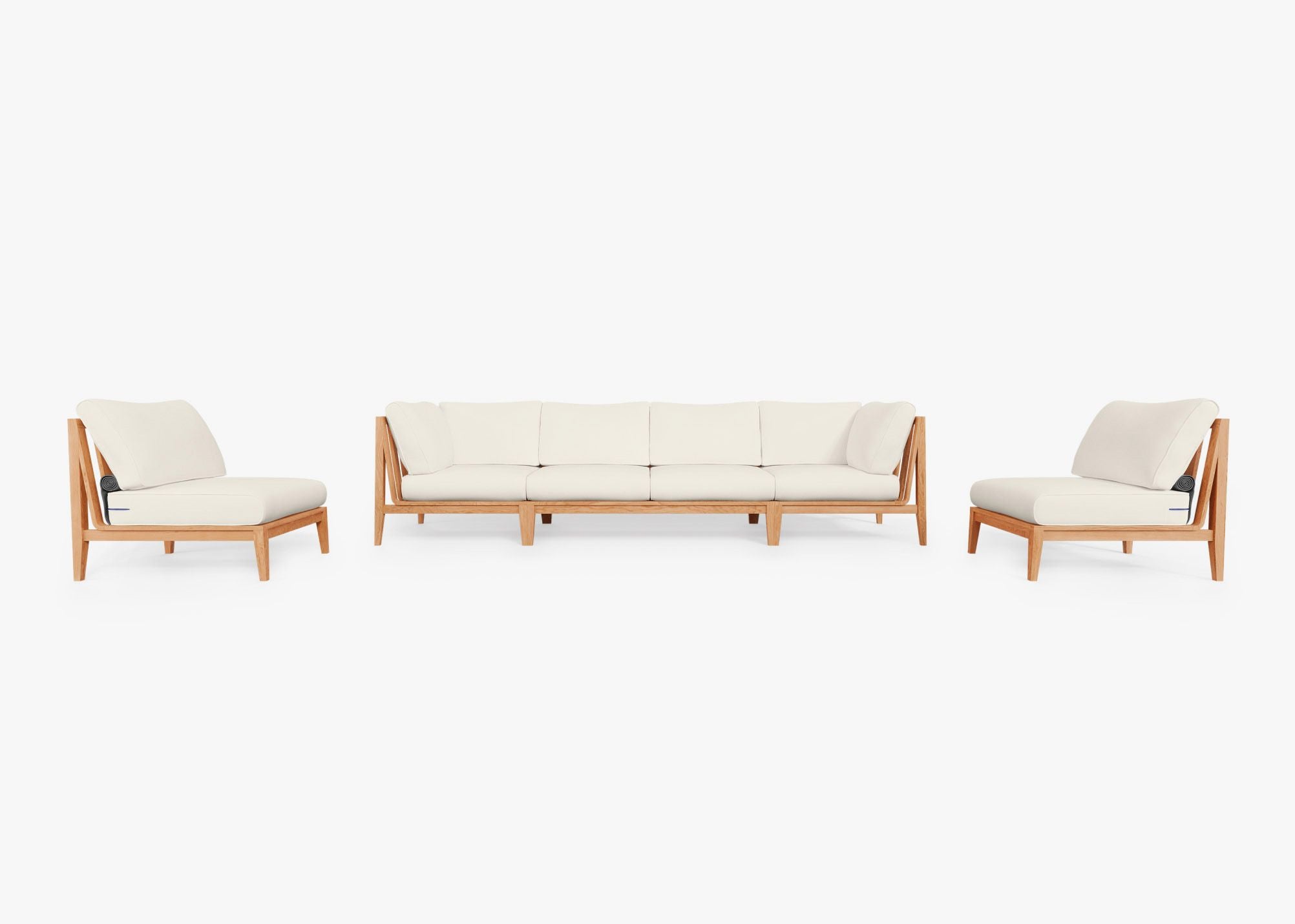 Teak outdoor sofa with cream cushions, featuring an armless design and paired with matching armless chairs on a wooden deck.-teak outdoor sofa-outer #color_palisades cream