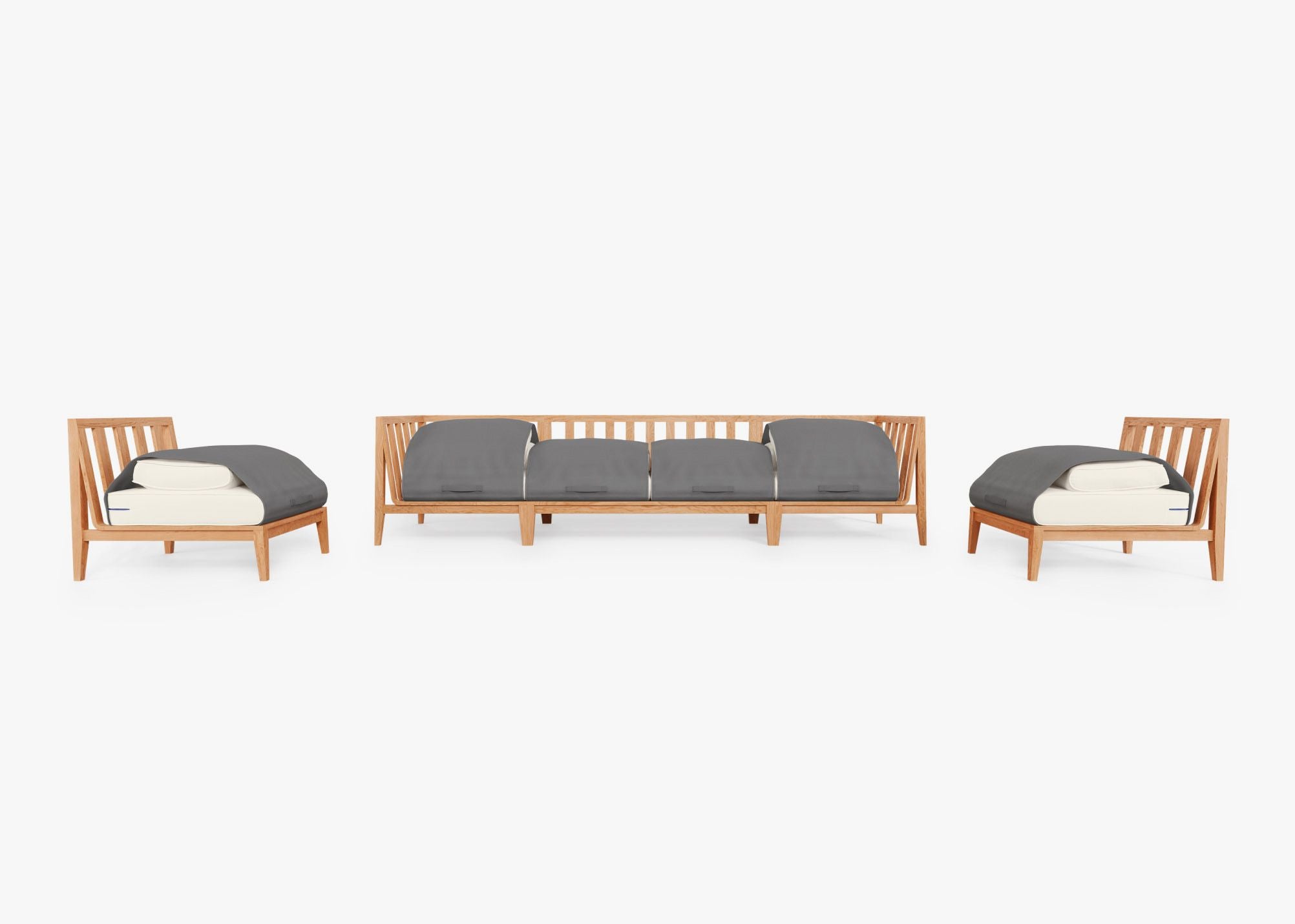 Teak outdoor sofa with cream cushions, featuring an armless design, placed on a wooden deck with matching armless chairs.-teak outdoor sofa-outer #color_palisades cream