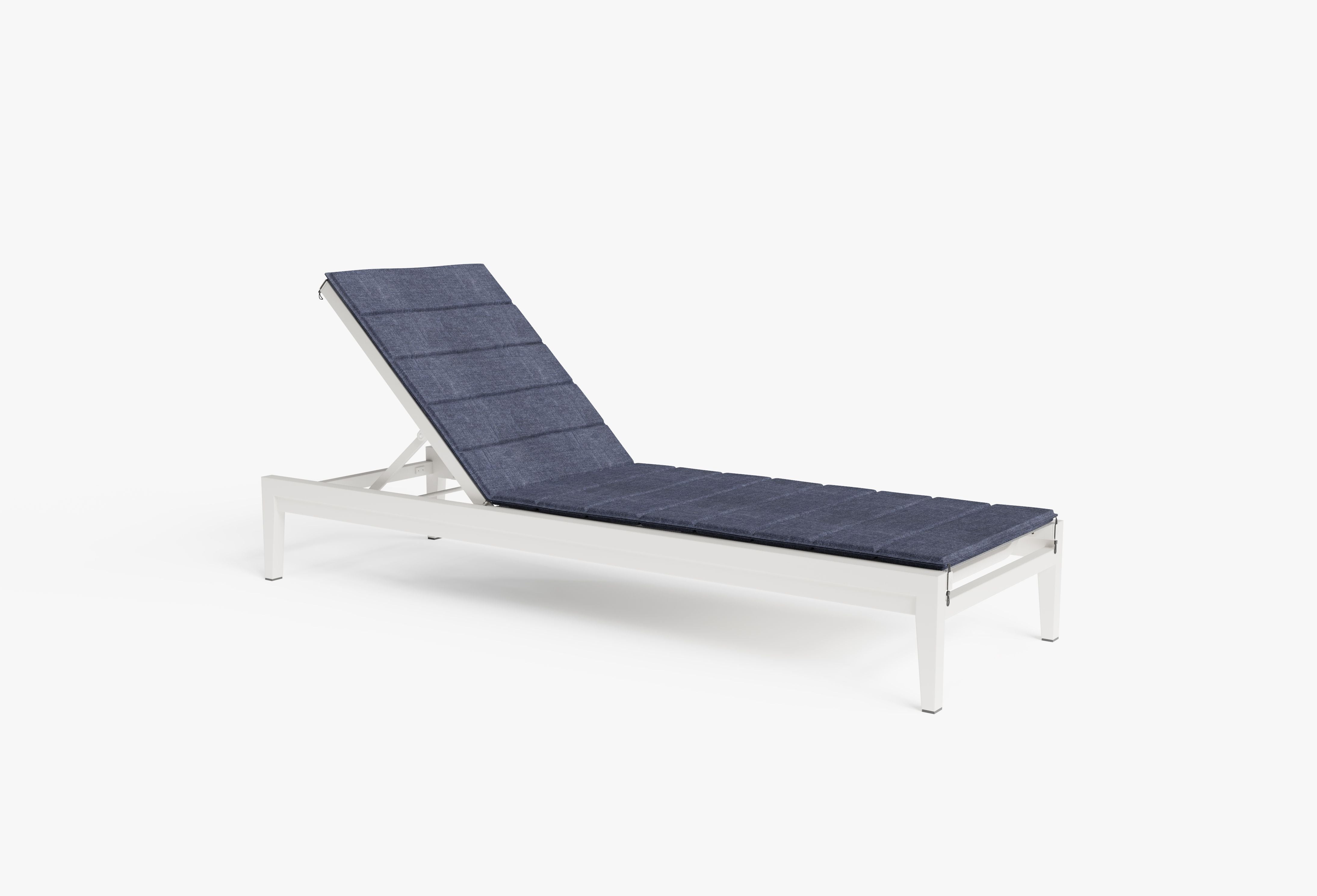 The optional OuterWeave cushion shown on the white aluminum core chaise lounge in deep sea navy. #color_deep sea navy