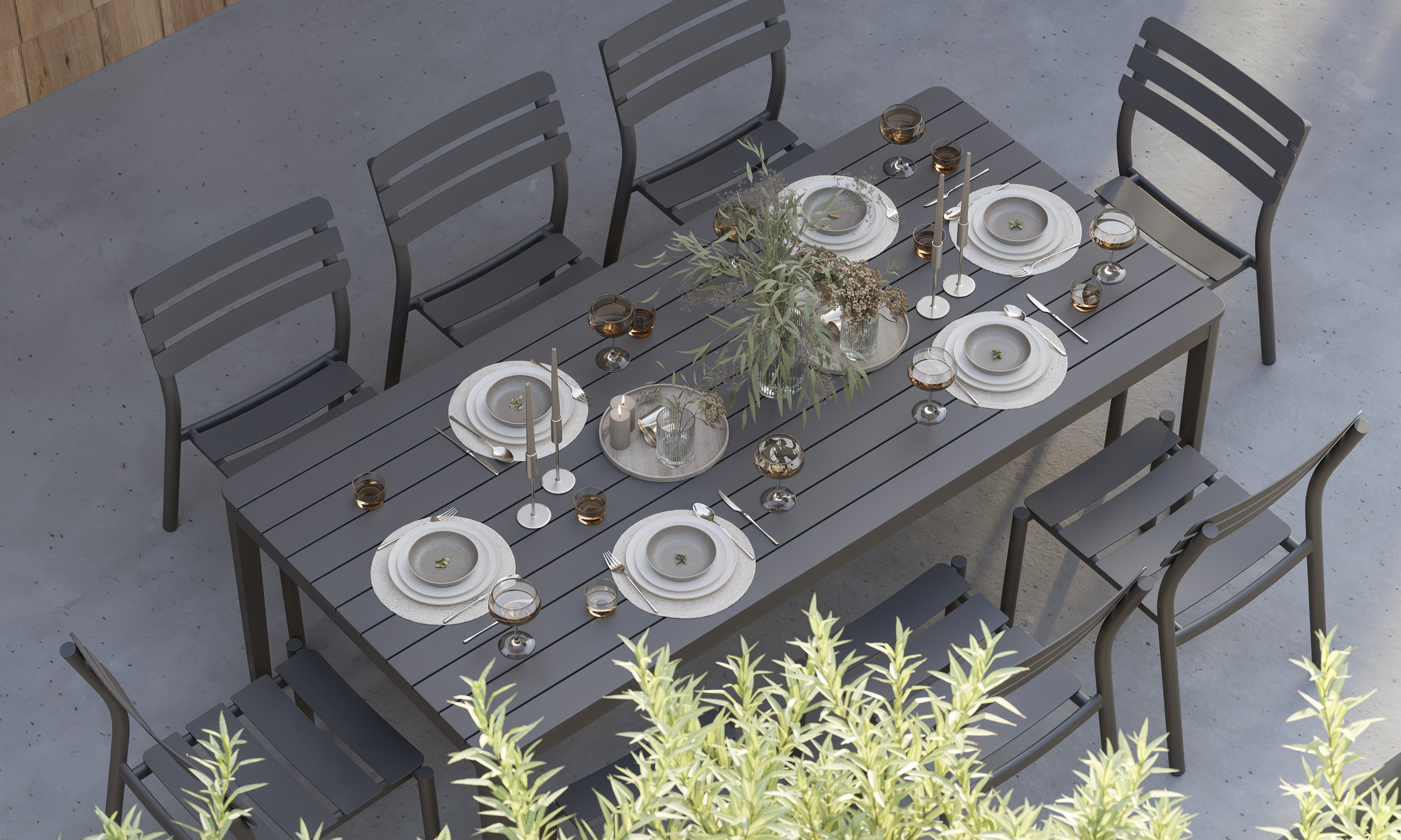 outer-Aluminum Outdoor Rectangular Dining Table + 8 595 Dining Armless Chairs-top down outdoor dining scene with rectangular aluminum table set for eight, styled tableware, candles and greenery on a modern patio