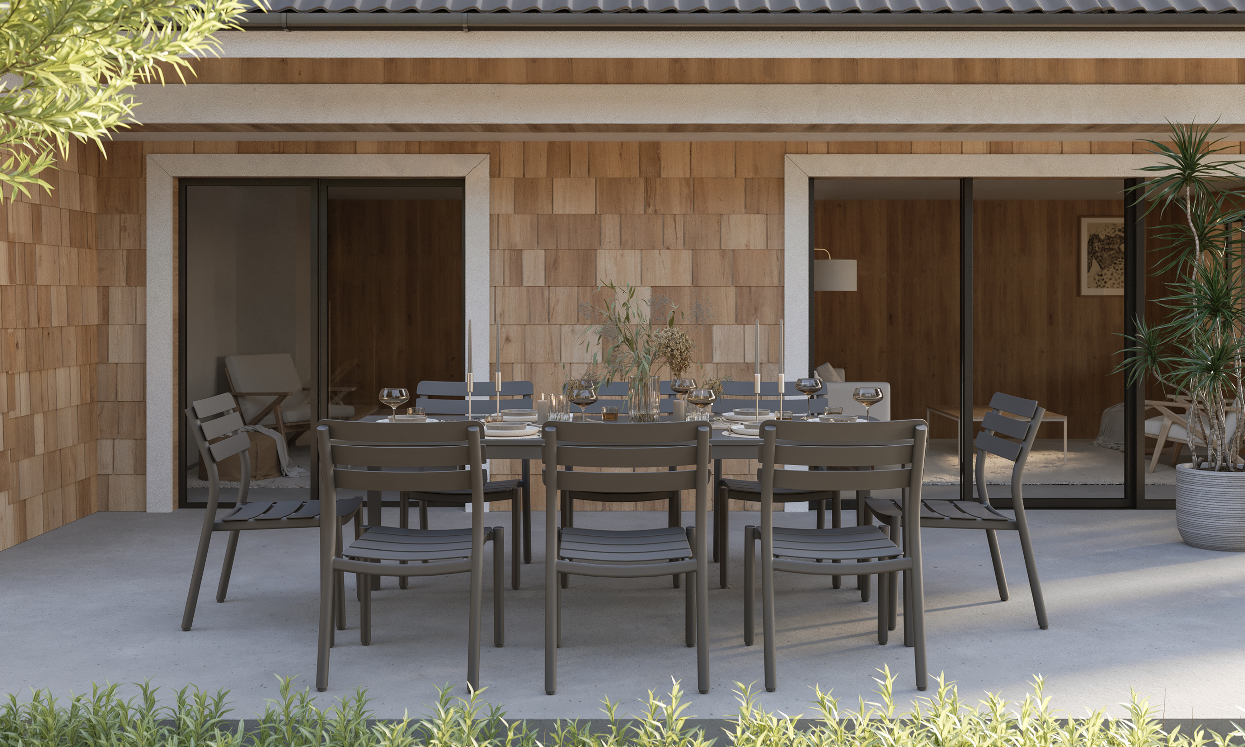 outer-Aluminum Outdoor Rectangular Dining Table + 8 595 Dining Armless Chairs-top down outdoor dining scene with rectangular aluminum table set for eight, styled tableware, candles and greenery on a modern patio