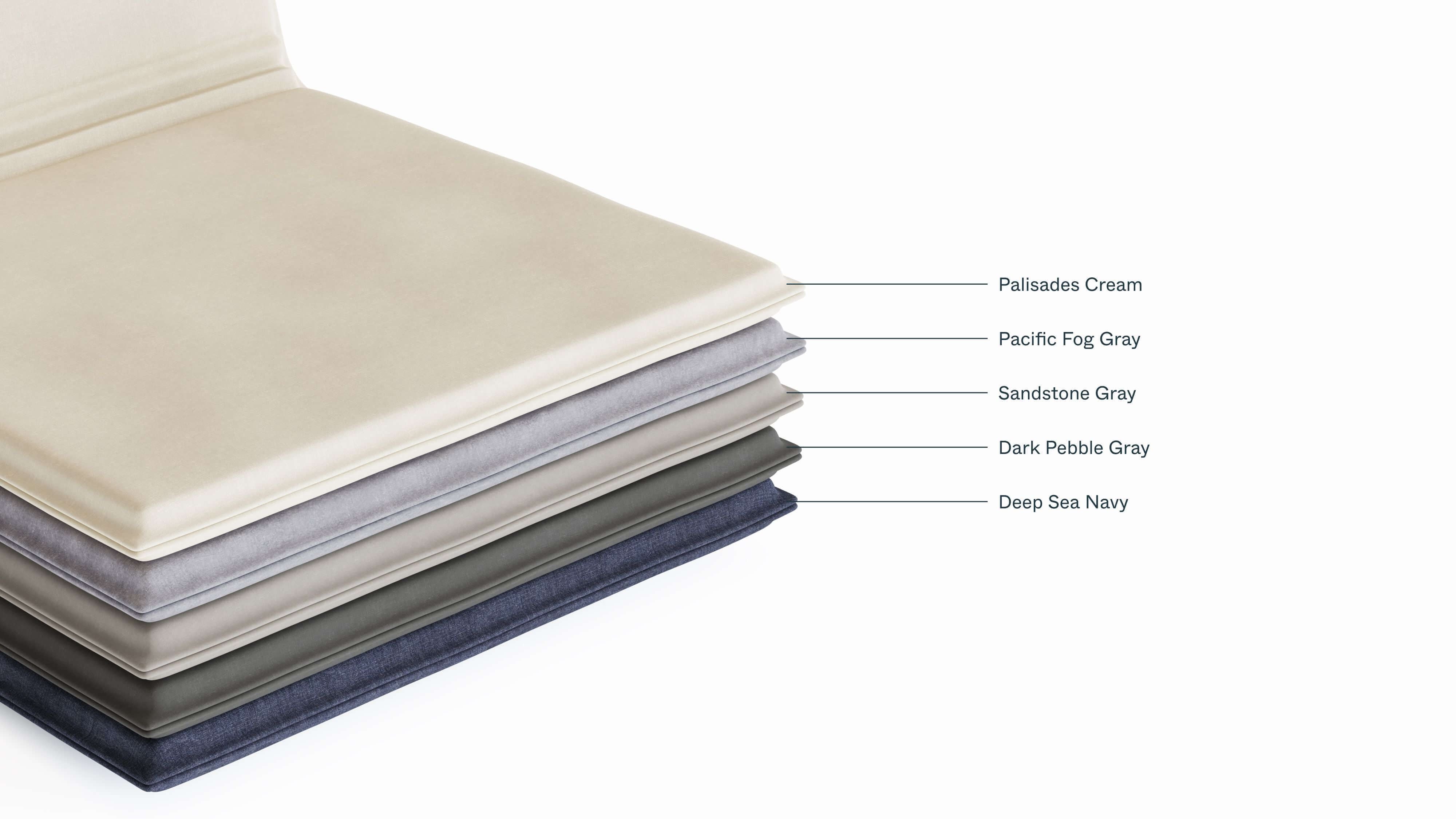 A stack of cushions showing the colors the optional cushion is available in.