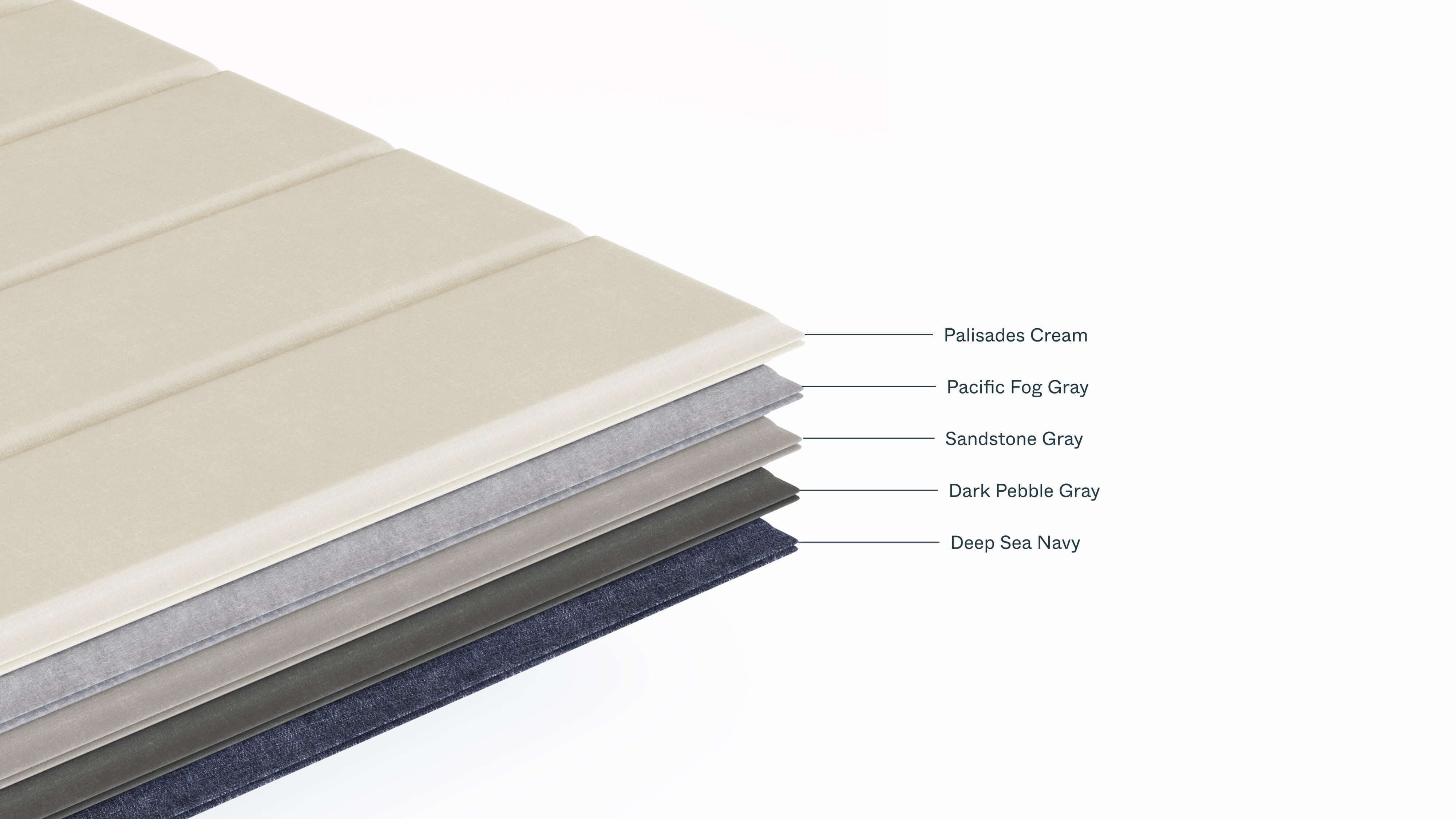 A stack of cushions showing the colors the optional Chaise Lounge cushion is available in .