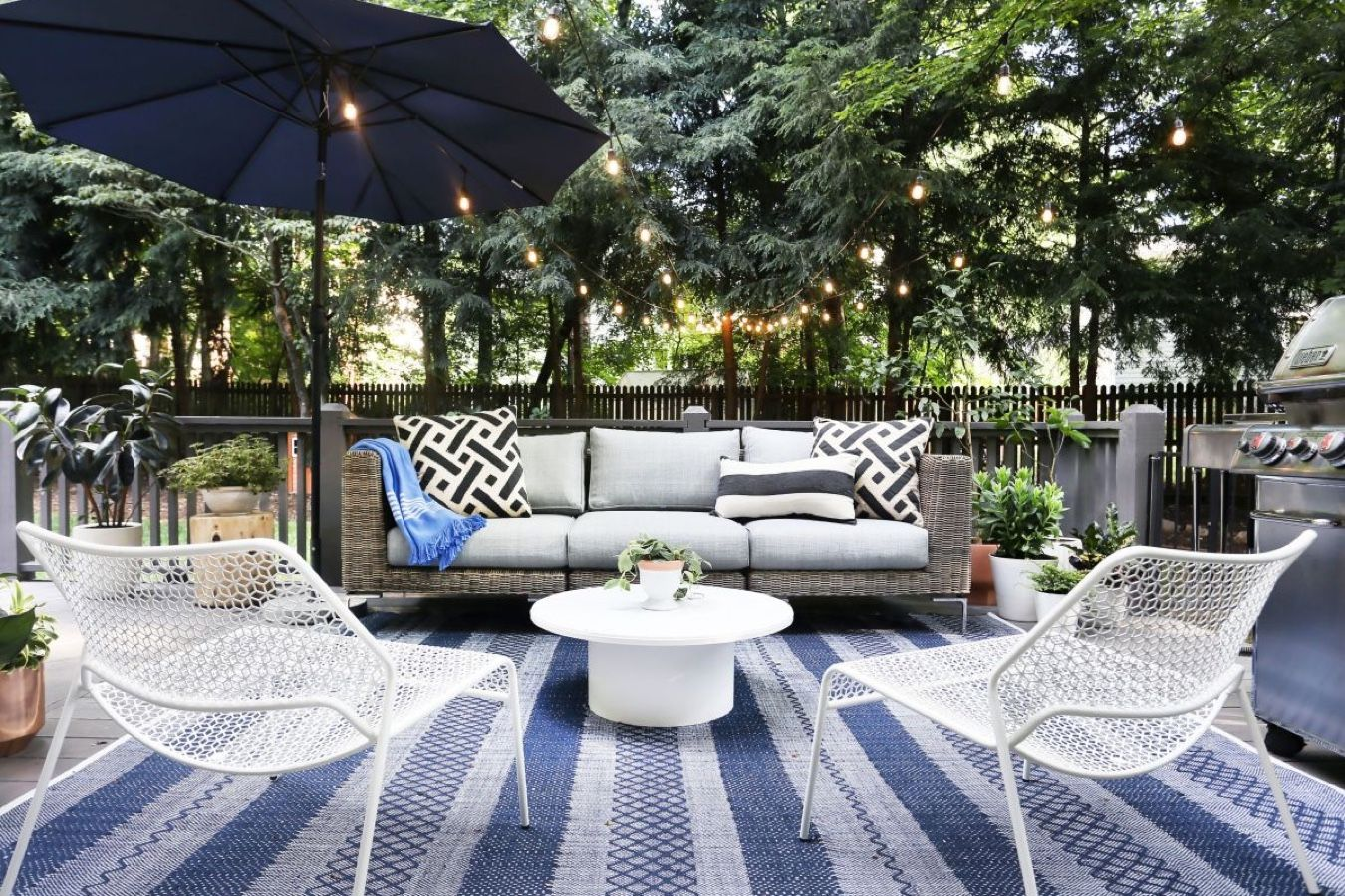 brown wicker sofa placed in the courtyard https://liveouter.com/