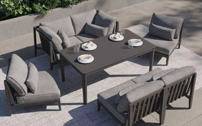 Aluminum rectangular outdoor dining table with six director chairs