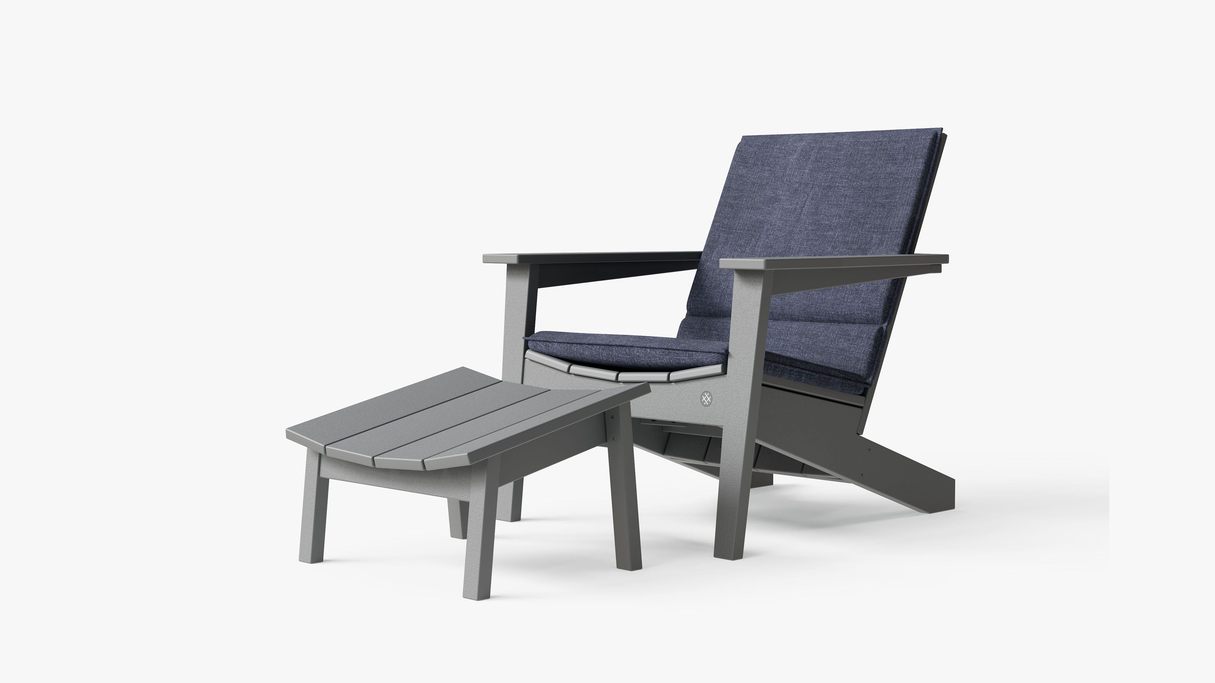 The adirondack shown with optional cushion in Deep Sea Navy. #color_deep sea navy