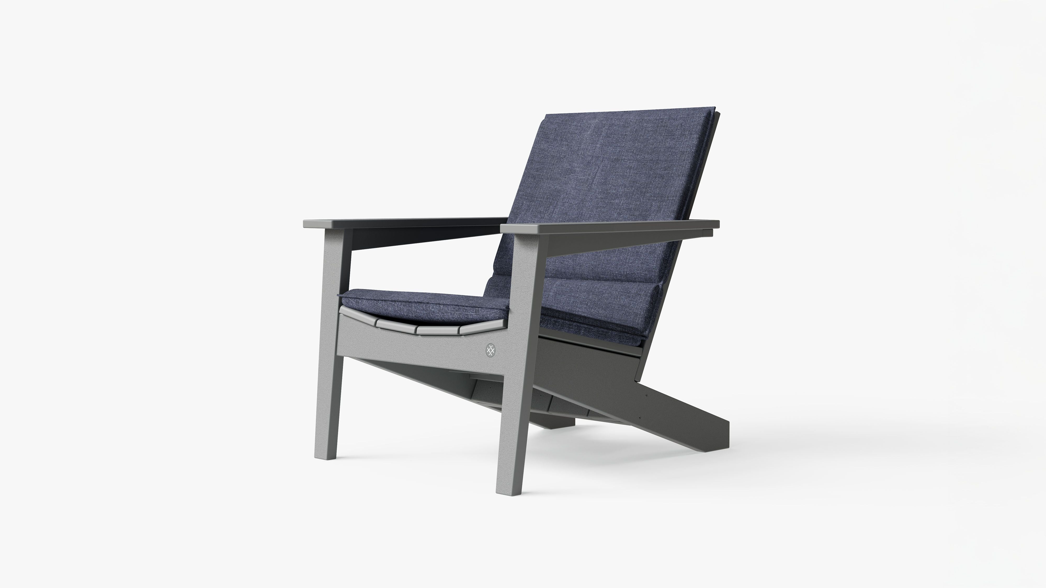 The adirondack shown with optional cushion in Deep Sea Navy. #color_deep sea navy