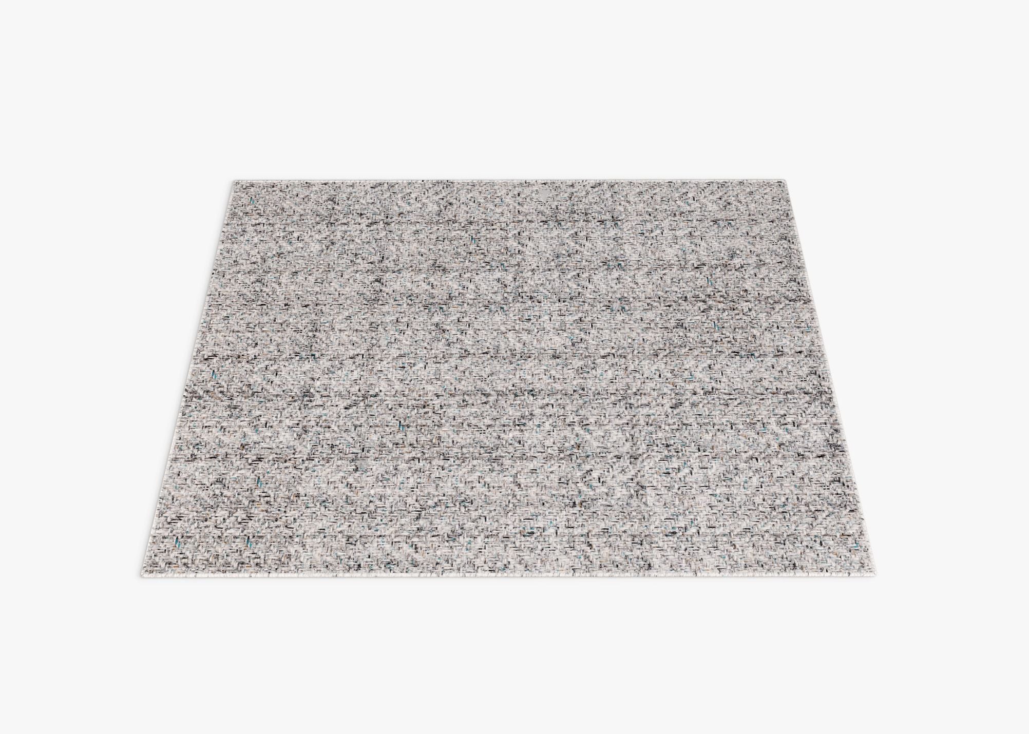 Eco-Friendly Outdoor Rug in Pebble Gray, laid flat, has a pattern that hides dirt.
