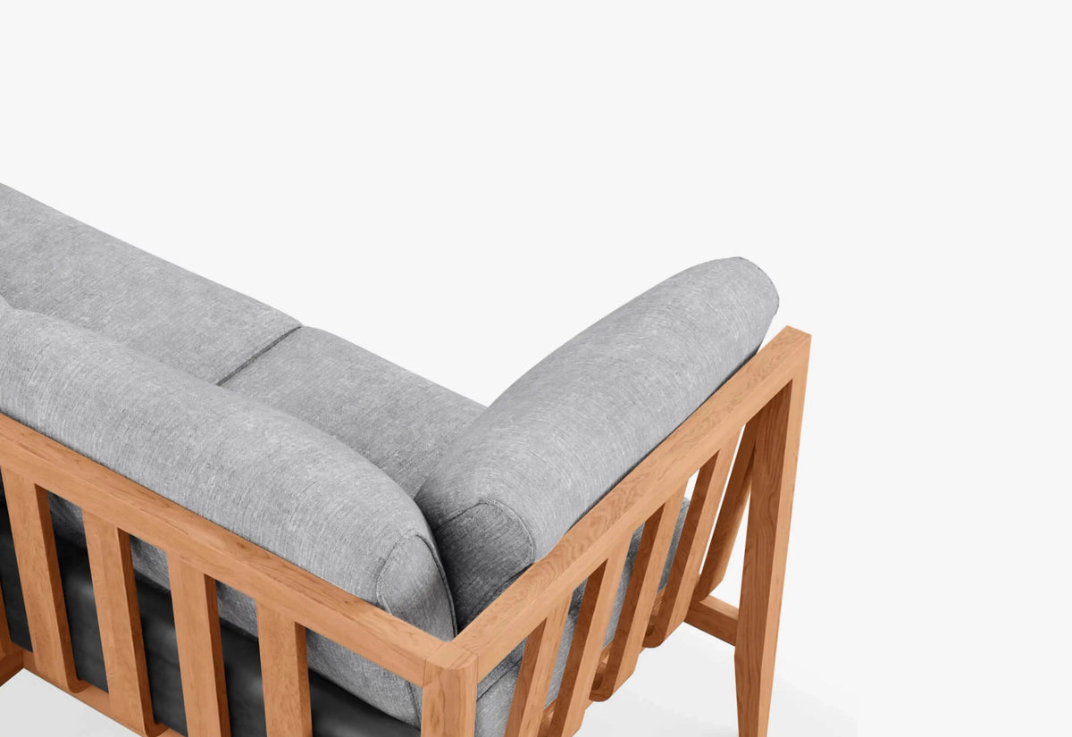 Teak outdoor sofa with OuterShell integrated cushion cover
