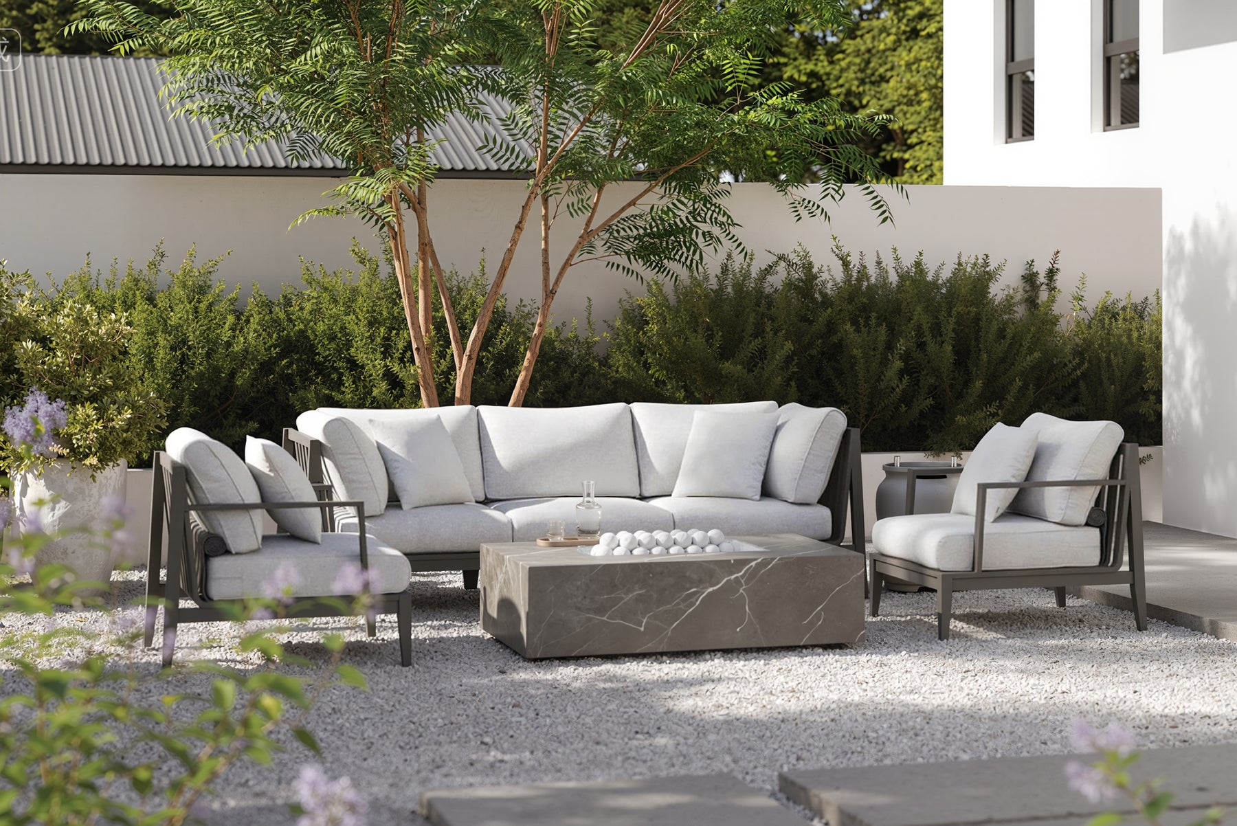Outdoor seating and fire pit arranged for protected everyday use