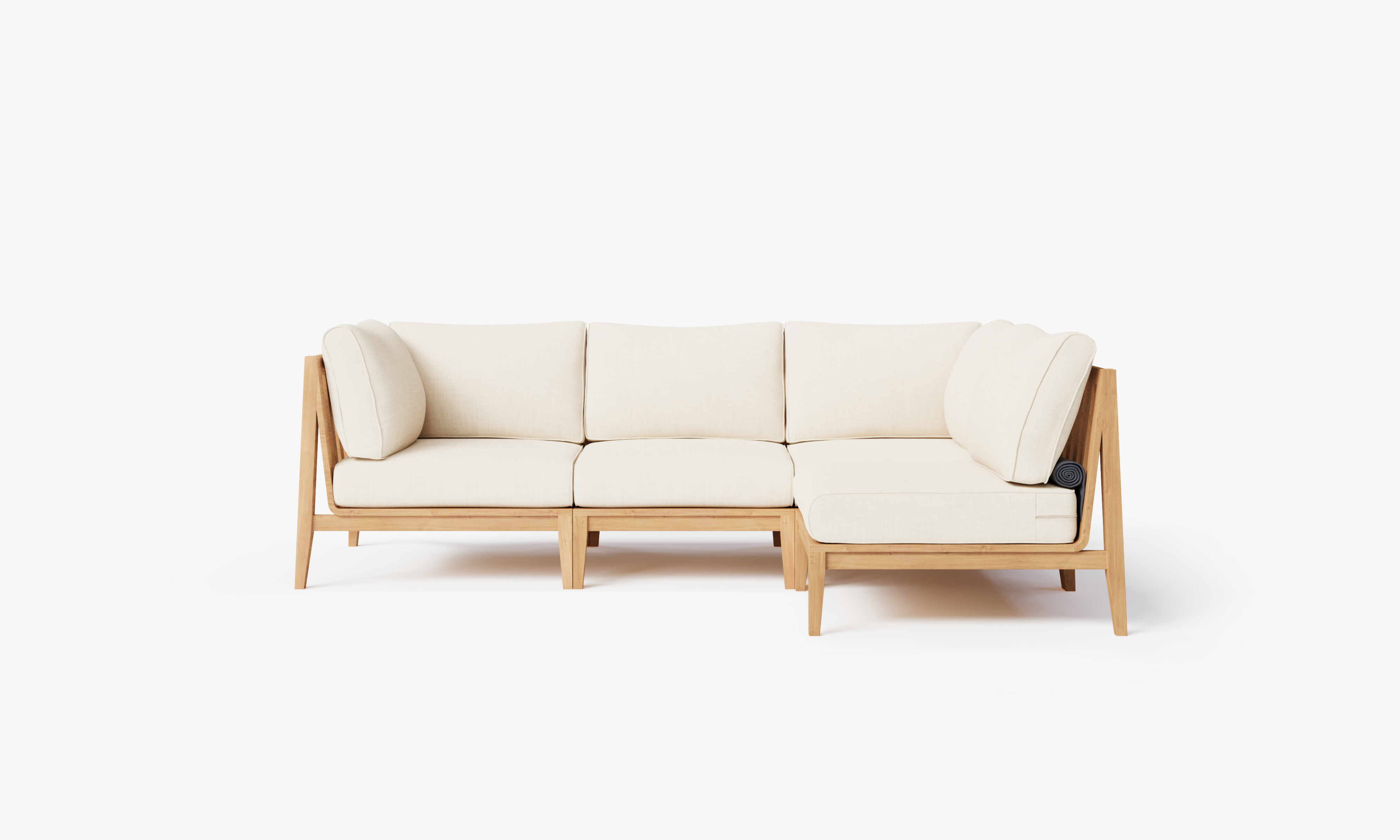 Teak outdoor L sectional sofa with 4 cream cushions arranged in an inviting corner seating setup.-teak outdoor sofa-outer #color_palisades cream