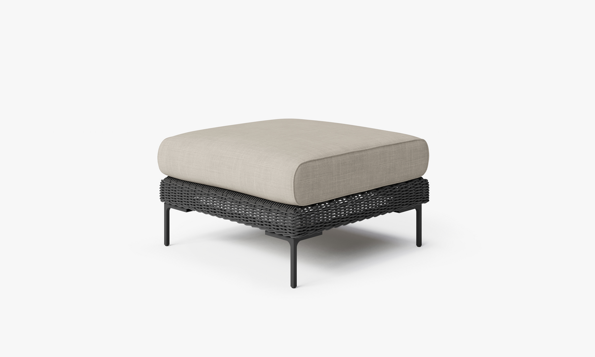 Black Wicker Outdoor Ottoman, front. Comfortable, durable, and weather resistant outdoor seating with memory foam. #color_sandstone gray